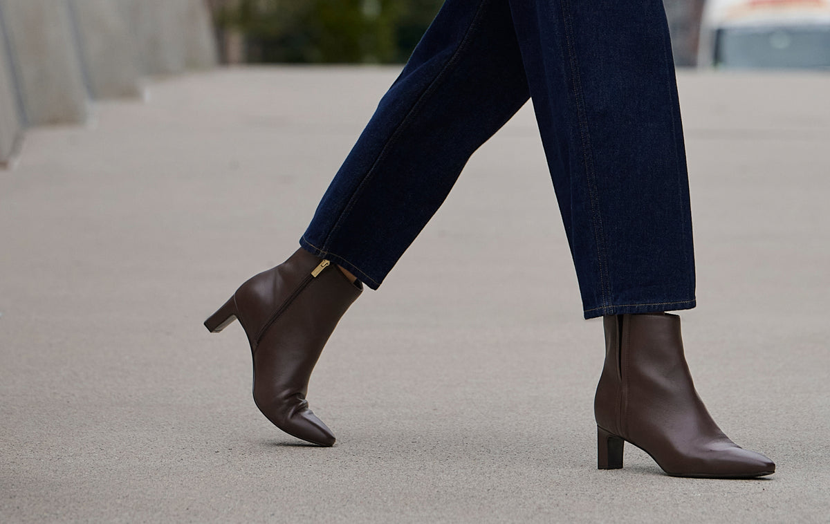 Editorial banner featuring model wearing Marisa booties